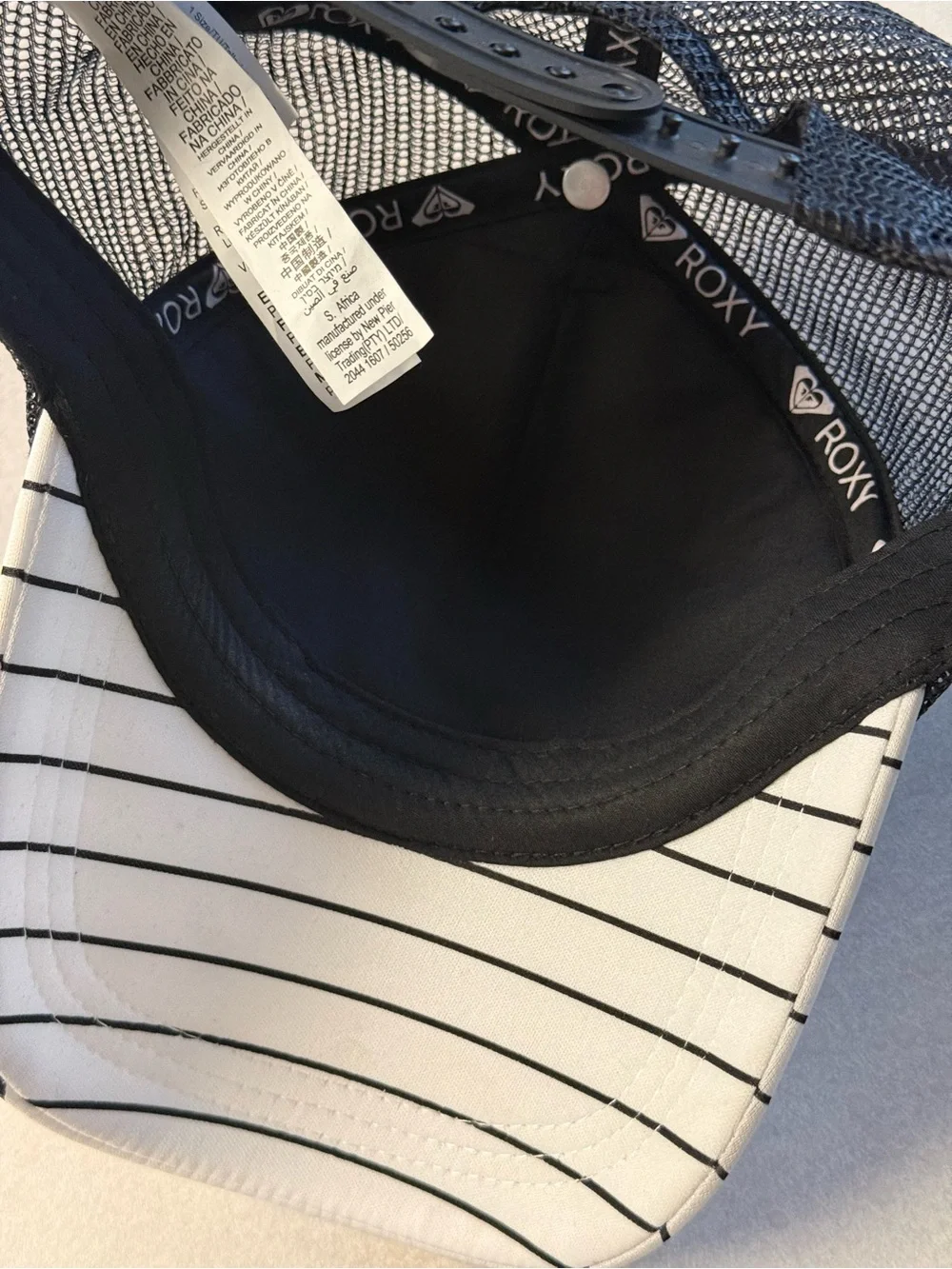 Roxy Black Floral Trucker Hat with White Striped Brim